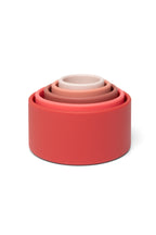 Kommen in rood en roze