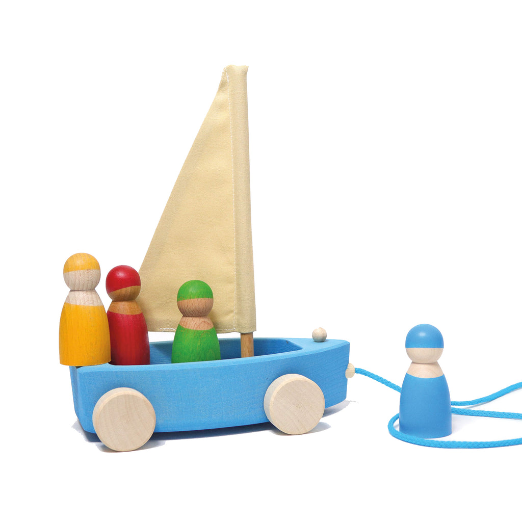 Grimm`s blauwe boot met wielen en 4 regenboogvrienden
