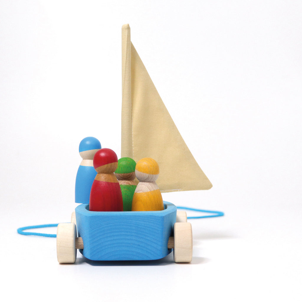 Grimm`s blauwe boot met wielen en 4 regenboogvrienden