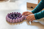 houten mandala maken met paarse eieren